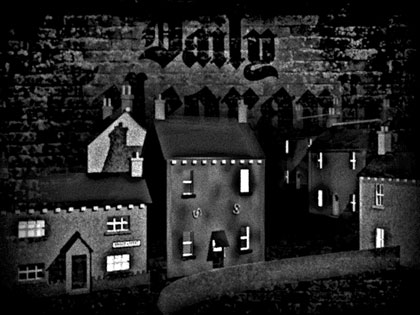 film still: Sleepy village: This scene is the first shot you see of the village after going through the viaduct. I was very new to 3D modelling at the time and had just learnt how to animate the cameras and so during much of the production one would enter the village flying over the viaduct with a really dramatic swooping camera. It was one of the first times I realised you could do really great things with the software which weren’t at all suitable for the type of film I was making!

