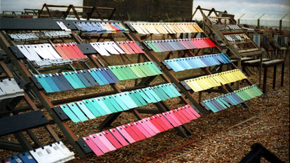 film still: Colour plates: This shot opens the film and introduces the vibrant colours of the coated plates at the site. It was taken as a 35mm still, the negative I processed myself, which I pushed to over-cook the colours. This was scanned to PC, printed up and re-filmed on my 35mm rostrum.

